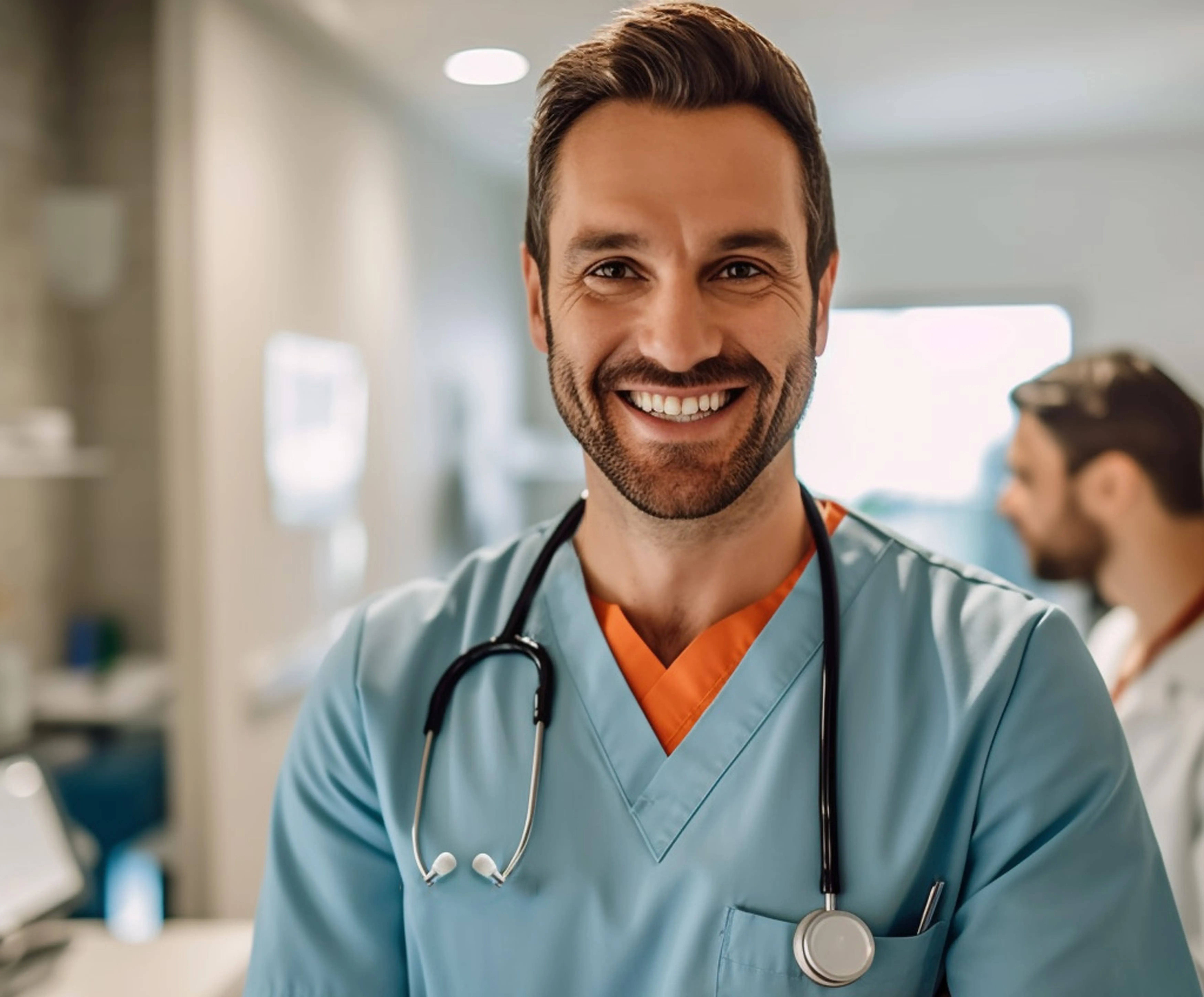Smiling doctor in scrubs with a stethoscope in a Dubai healthcare facility